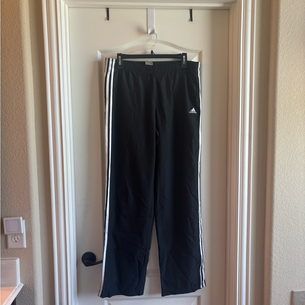 Adidas Black and White Track Pants with Iconic Stripes